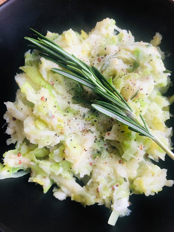This Healthier Vegan Leek & Parsnip Mash is just so tasty and perfect alongside any dish really. It's hight on fiber, low on fat, low on carbs, and it's vegan! How awesome is that? It's super easy to make too, simply boil the parsnips, sweat down the leeks with some beautiful rosemary and garlic, mash the ingredients together and voila!